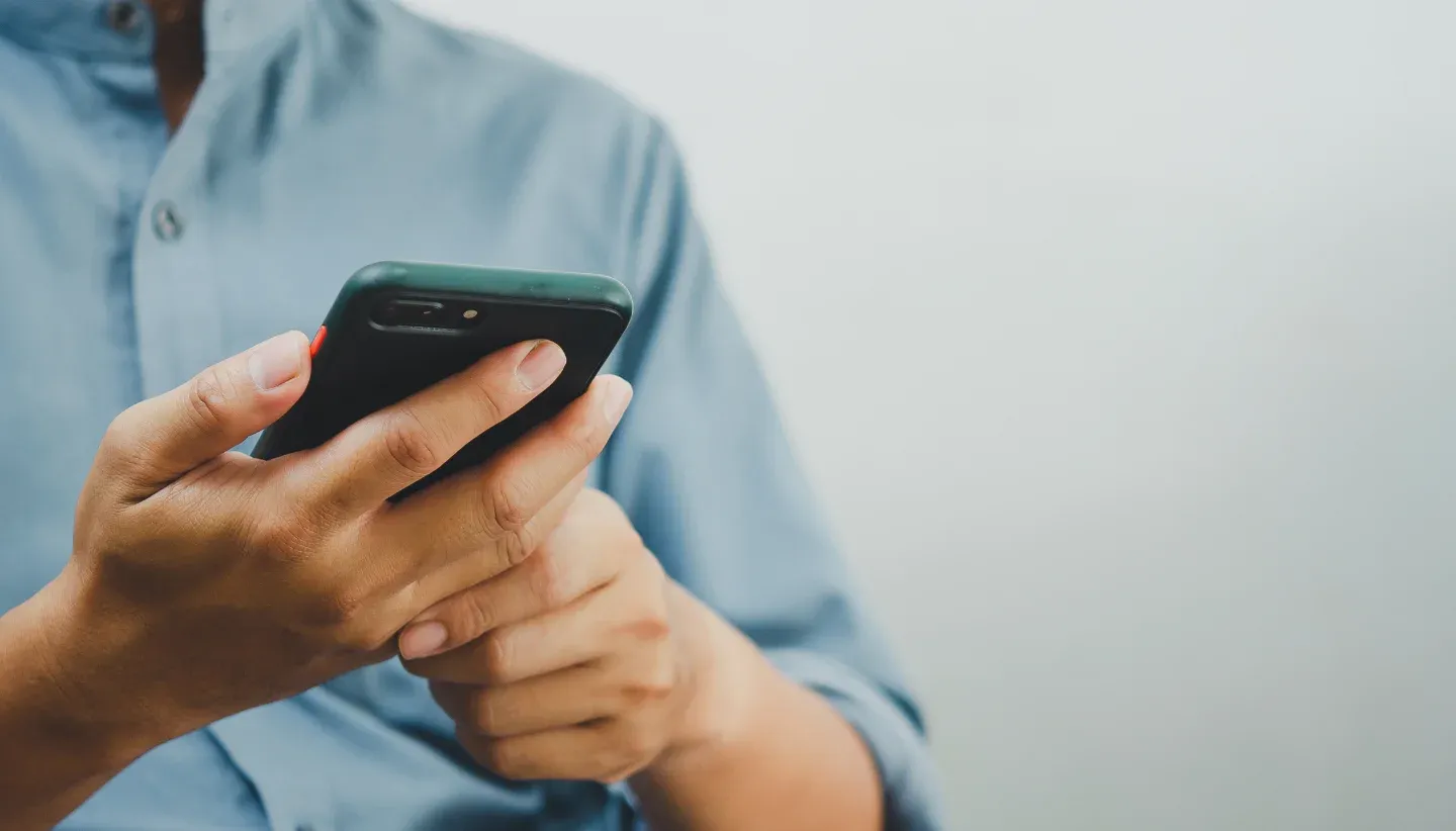 man holding his mobile phone